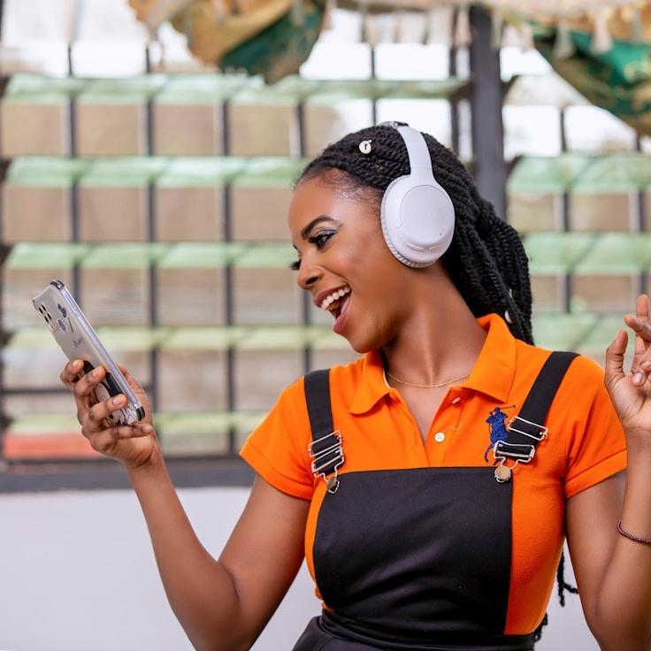 Kaveri Mehta, Lead Design Curator at OakLeafStudio, reviewing corporate floral arrangements